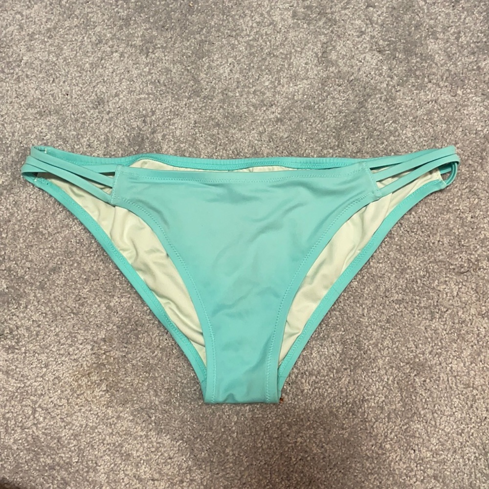Bright teal bathing suit bottoms